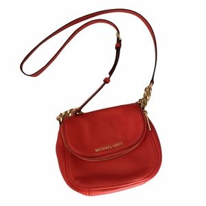 Michael Kors bright red fold over top cros…